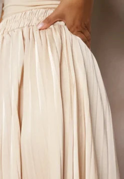 Beżowa Asymetryczna Spódnica Plisowana High Waist z Gumką w Talii i Koronkowymi Wstawkami Reslifa