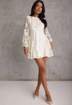 Beżowa Transparentna Sukienka w Kwiaty o Rozkloszowanym Kroju Delamna