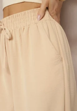 Beżowe Casualowe Spodnie High Waist Wykończone Gumką w Pasie Dimrue