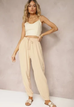 Beżowe Casualowe Spodnie High Waist Wykończone Gumką w Pasie Dimrue