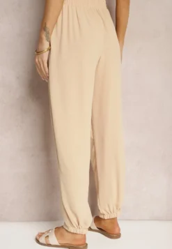 Beżowe Casualowe Spodnie High Waist Wykończone Gumką w Pasie Dimrue