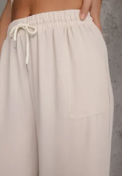 Beżowe Spodnie High Waist ze Sznurkiem w Talii i Prostą Nogawką Raveann