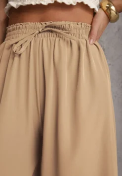 Beżowe Spodnie High Waist z Szerokimi Nogawkami z Wiskozą Wykończone Gumką w Talii Crisantas