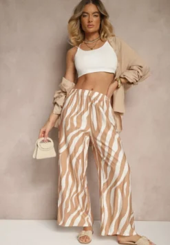 Beżowo-Białe Spodnie o Szerokim Kroju High Waist Ozdobione Paskami Lisamelia