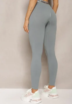 Ciemnozielone Sportowe Legginsy Elastyczne z Ozdobną Szeroką Gumą w Pasie Larnode