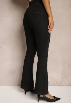 Czarne Jeansy High Waist o Kroju Dzwonów z Dodatkiem Bawełny Wykończone Guzikami Nevisca