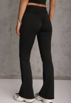 Czarne Legginsy Flare High Waist Ozdobione z Tyłu Modelującym Marszczeniem Deinoreia