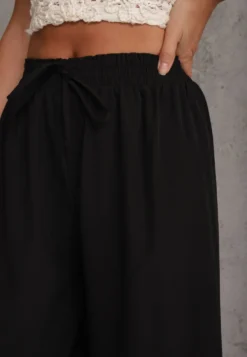 Czarne Spodnie High Waist z Szerokimi Nogawkami z Wiskozą Wykończone Gumką w Talii Crisantas