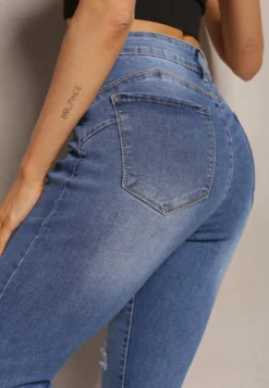 Granatowe Dopasowane Jeansy Skinny z Efektem Push Up i Przedarciami Avotia