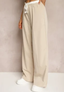 Jasnobeżowe Materiałowe Spodnie z Szerokimi Nogawkami High Waist z Gumką w Talii Comina