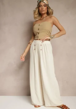 Jasnobeżowe Spodnie z Bawełną o Szerokim Kroju High Waist Ozdobione Guzikami Morritia