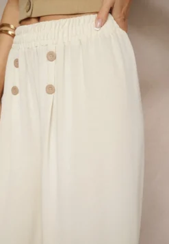 Jasnobeżowe Spodnie z Bawełną o Szerokim Kroju High Waist Ozdobione Guzikami Morritia