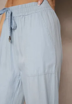 Jasnoniebieskie Spodnie z Bawełną High Waist Ozdobione Wiązaniem Calwia