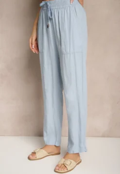 Jasnoniebieskie Spodnie z Bawełną High Waist Ozdobione Wiązaniem Calwia