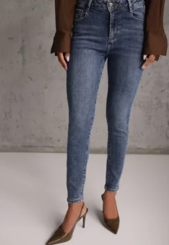 Niebieskie Bawełniane Elastyczne Jeansy o Kroju Skinny z Efektem Przejaśnień Ganra