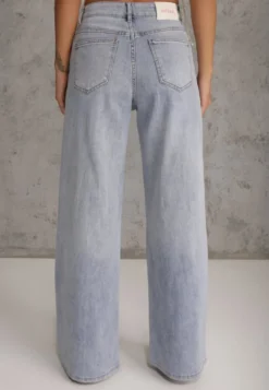 Niebieskie Jeansy Szerokie w Stylu Boho z Ozdobnym Nadrukiem na Nogawkach Endippe