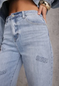 Niebieskie Szerokie Jeansy High Waist z Ozdobnymi Naszywkami Hleffia