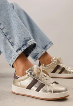 Złote Sneakersy Ozdobione Paskami Dolirenna